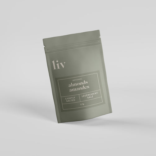 LIV’s 57g hand-roasted almonds in Lightly Salted flavour, crafted in small batches for a savoury crunch; elegantly packed for everyday snacking or refined gifting.