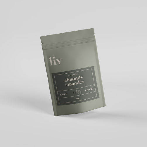 LIV’s hand-roasted almonds in Mild Spicy flavour, a balanced blend of subtle heat and rich roasted depth; small-batch crafted for gourmet snacking.